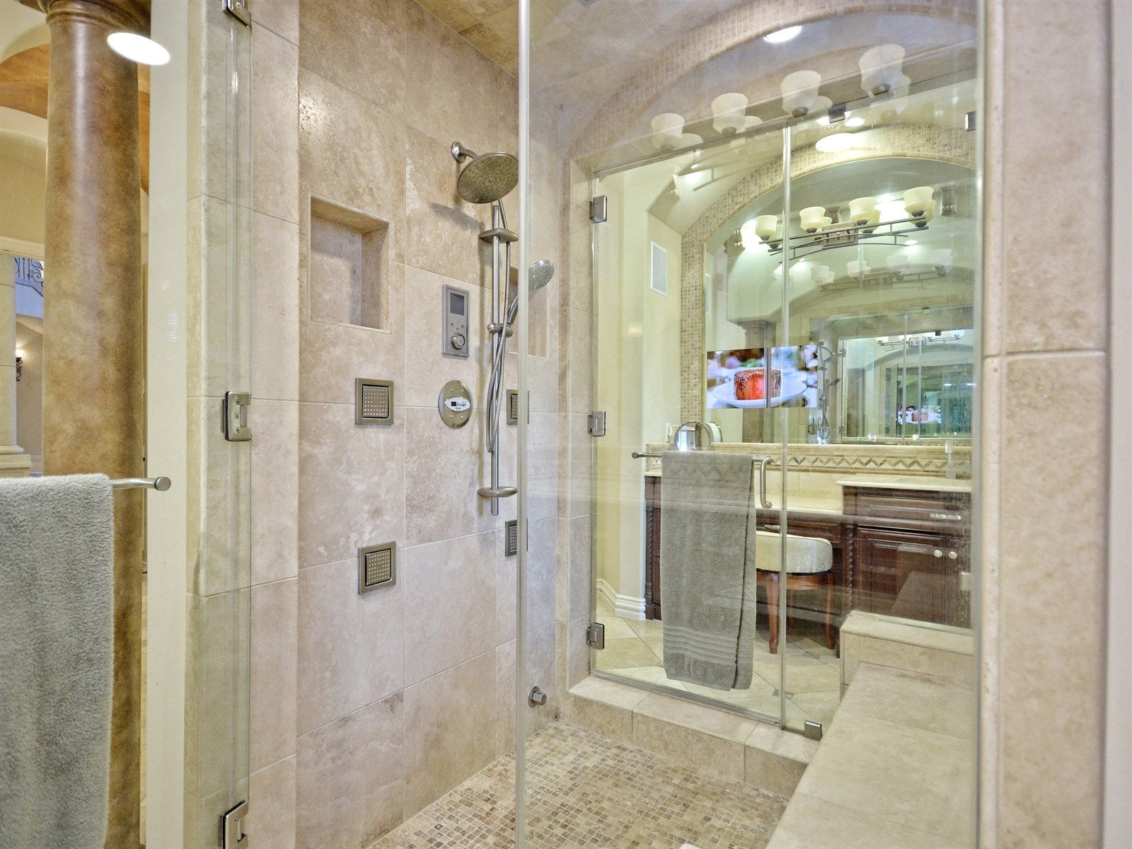 Primary steam shower and mirror TV